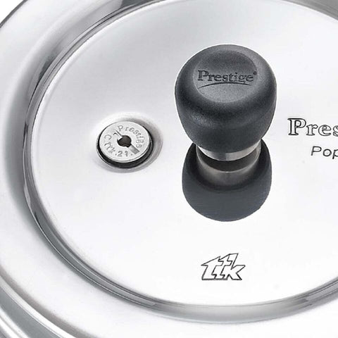 Image of a stainless steel cooking pot with a lid and a polished finish, designed for versatile cooking.